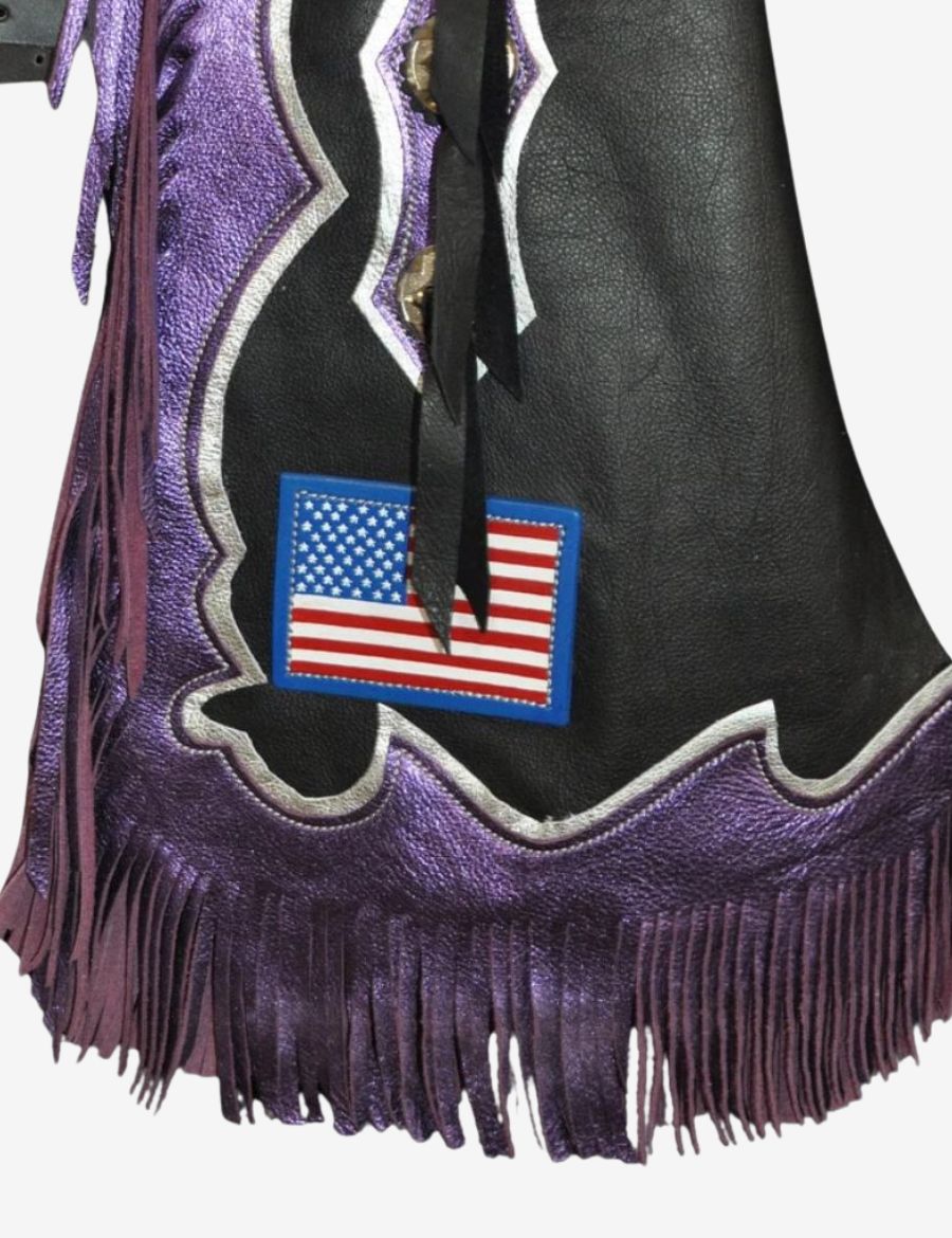 Detailed view of American flag rodeo chaps with purple leather fringe, USA patch, and bold western rodeo design.
