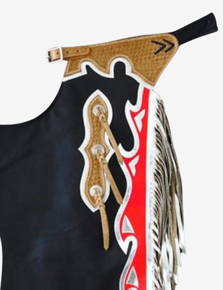 Yoke detail of black bull riding chaps featuring basket tooled leather and western trim accents.