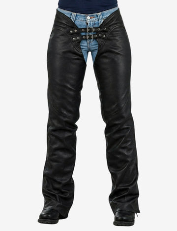 Front view of assless motorcycle chaps for women featuring black leather panels, denim waist integration, and lace-up riding design for protective motorcycle wear.