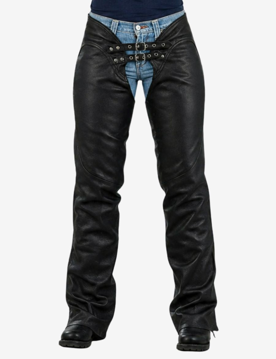 Front view of assless motorcycle chaps for women featuring black leather panels, denim waist integration, and lace-up riding design for protective motorcycle wear.