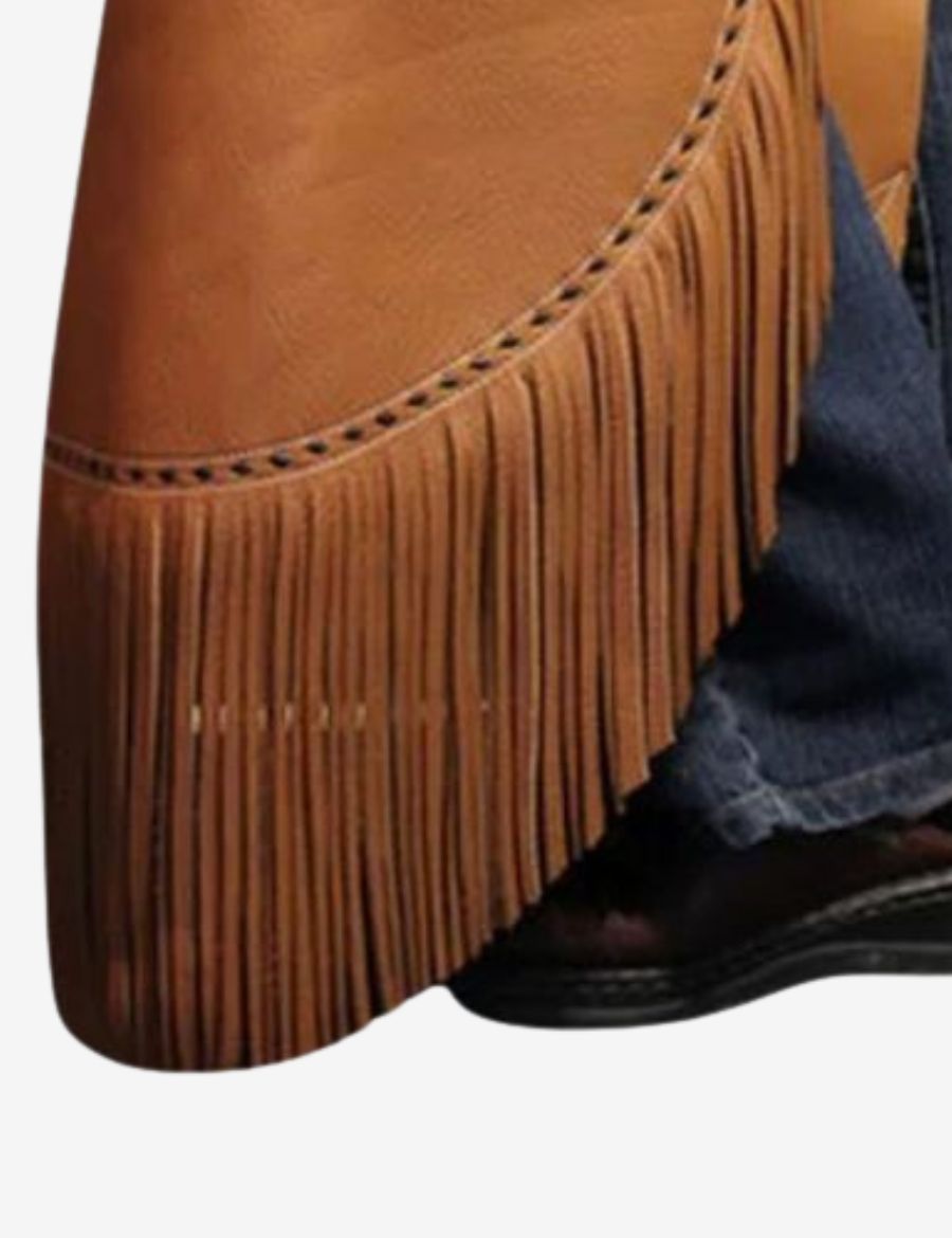 Bottom fringe detail of basketweave cowhide leather chinks chaps with classic western cowboy styling.
