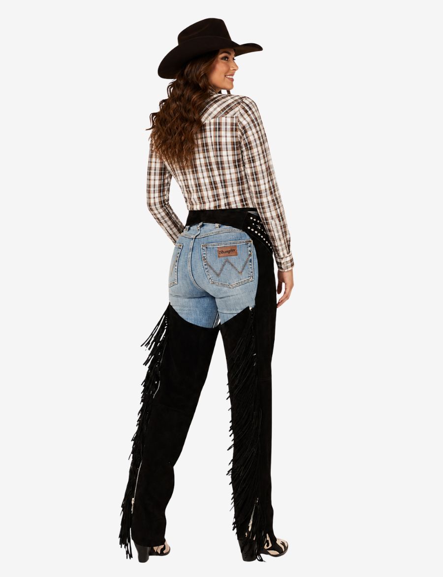 Rear close view of black suede assless cowgirl chaps featuring fringe and fitted western design.
