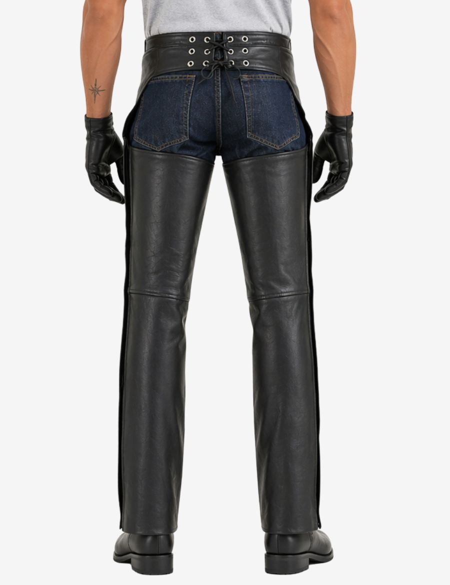 Back view of black cowhide leather motorcycle chaps with lace-up rear waistband and full leg riding coverage.