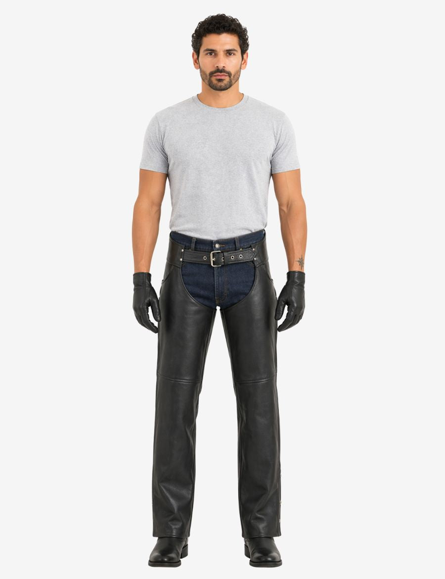 Angled front view of black cowhide leather motorcycle chaps with rugged biker design and protective fit.