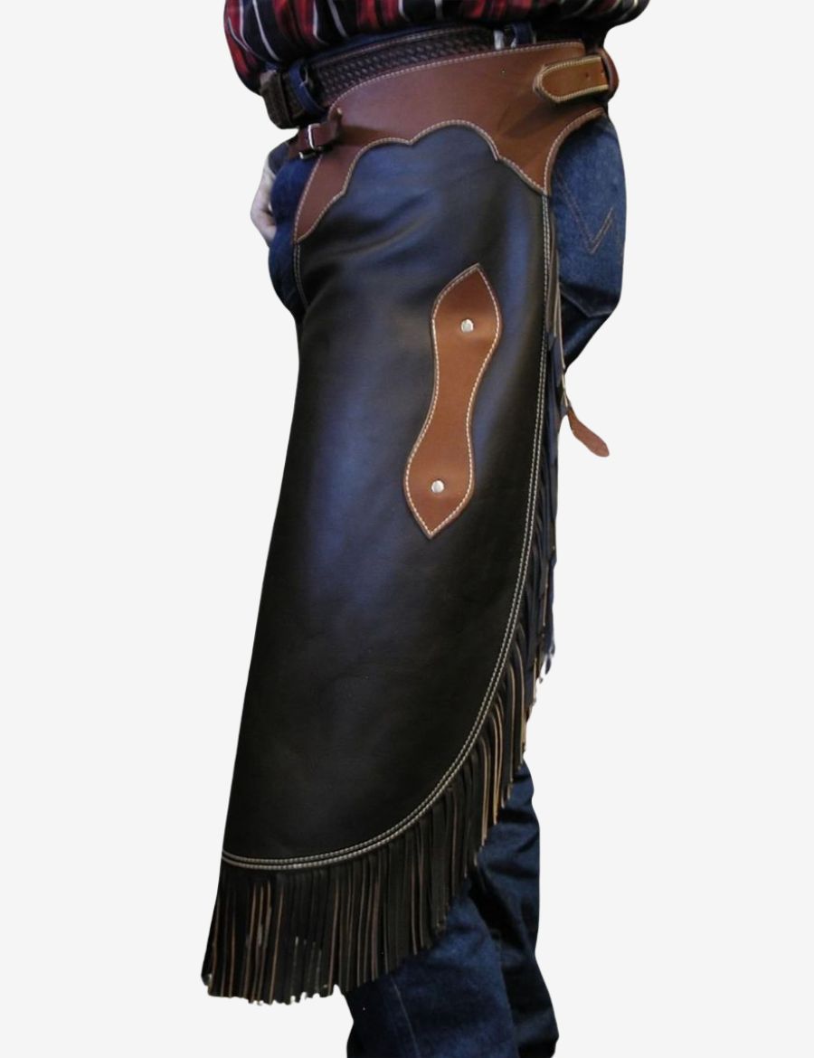 Side view of black leather chinks chaps showing long fringe details and traditional western craftsmanship.