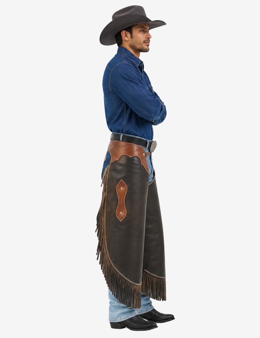 Side model view of black leather chinks chaps worn with jeans featuring classic rodeo and ranch styling.