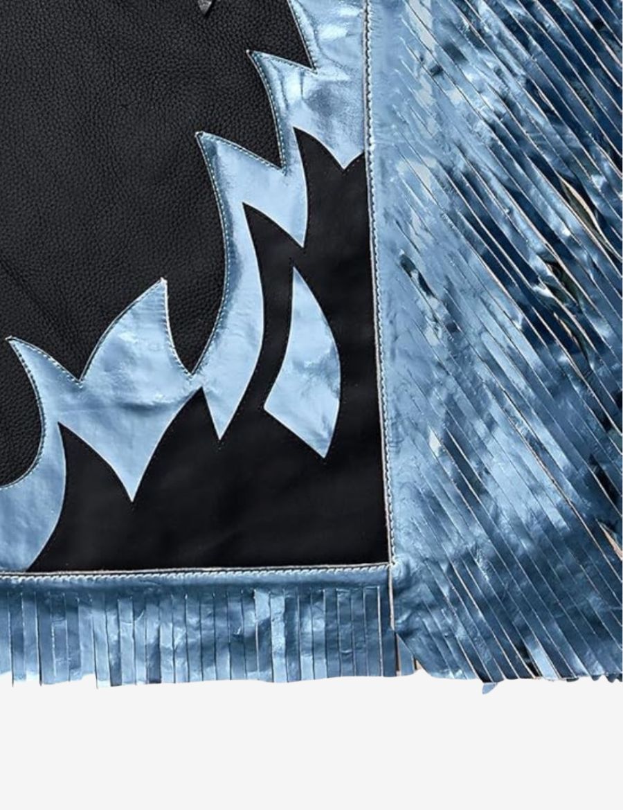 Detailed fringe view of black rodeo chaps showcasing layered metallic fringe and premium western leather craftsmanship.