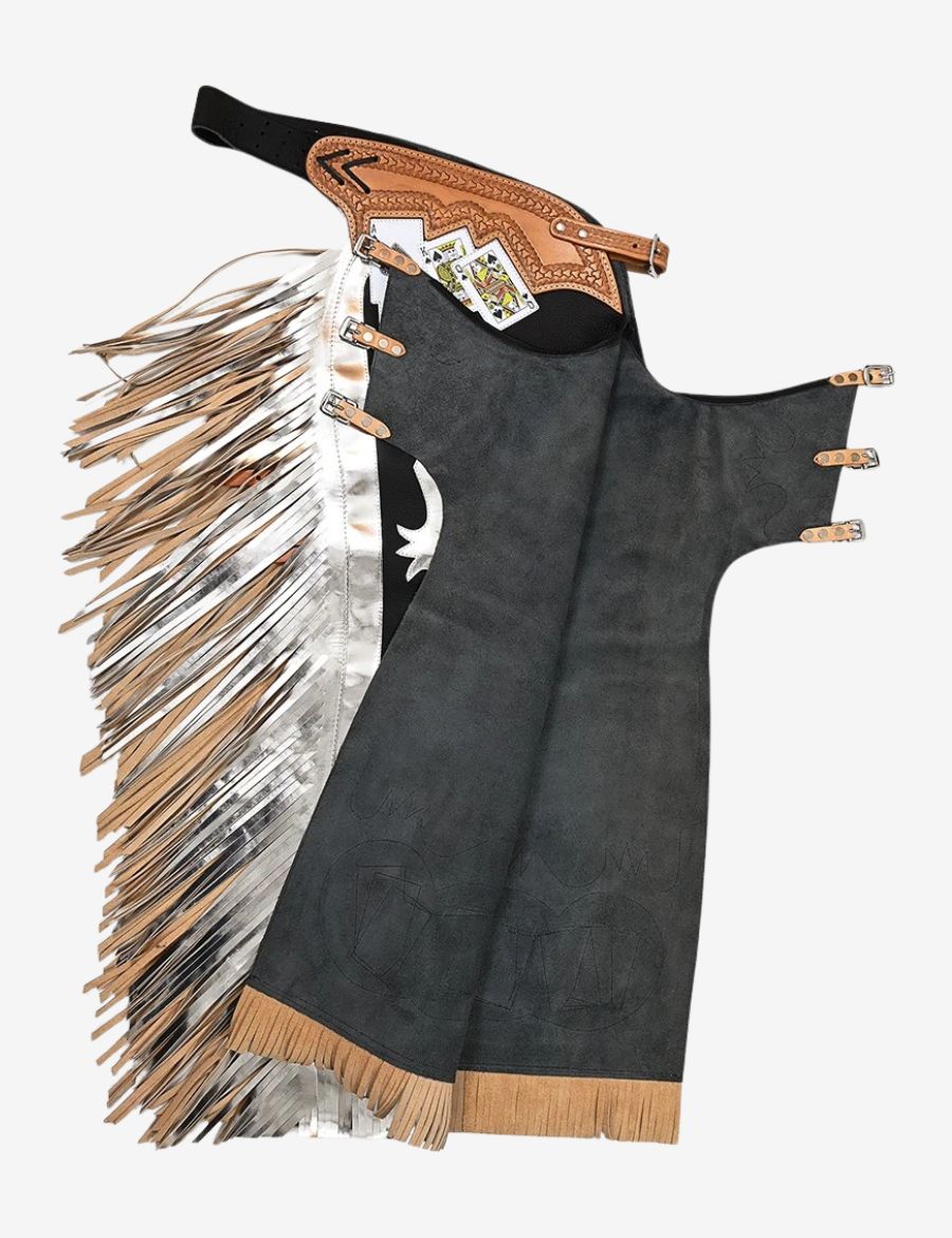 Back view of black and silver bull riding chaps featuring suede interior, buckle straps, and layered metallic fringe.