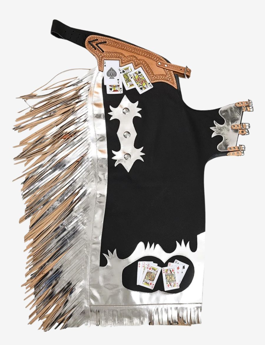 Black and silver bull riding chaps with metallic fringe, card graphics, and western rodeo leather detailing.