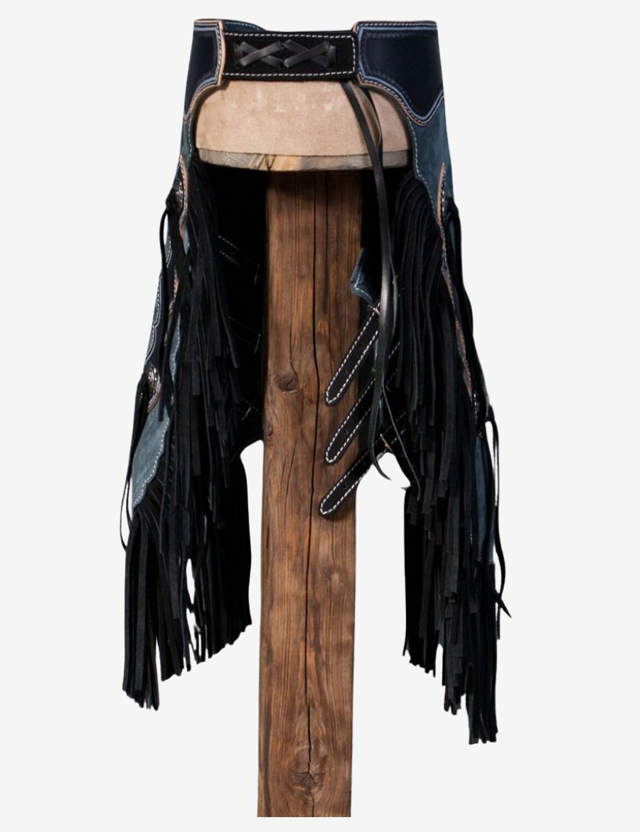 Back view of blue suede cowboy chinks chaps with leather lacing, long black fringe, and western craftsmanship.