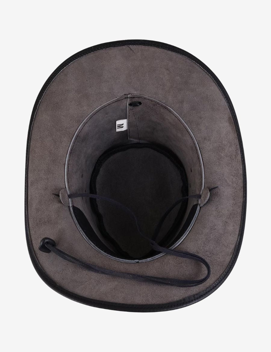 Interior view of braided black leather cowboy hat showing adjustable chin strap, leather construction, and structured crown.