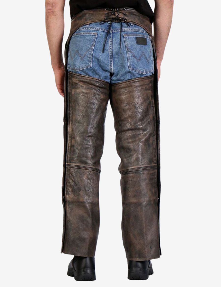Back view of distressed brown leather assless chaps with adjustable lace waist and straight biker leg fit.