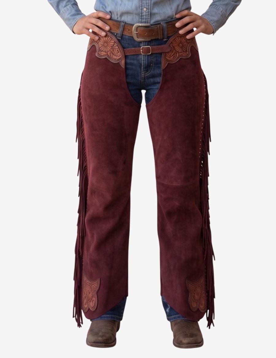 burgundy tooled women’s western chaps with floral tooling, fringe sides, and suede leather finish.