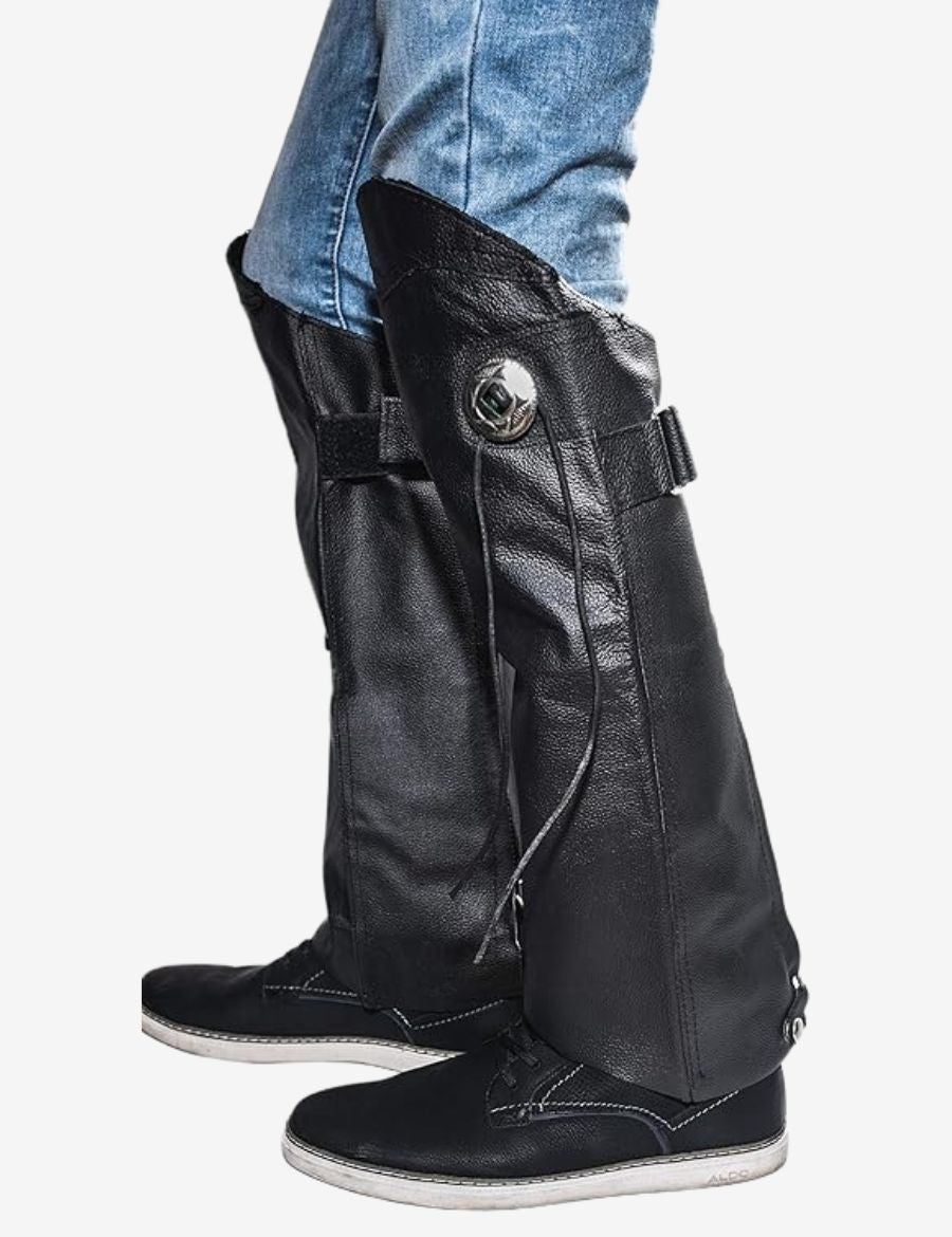 Side view of classic black motorcycle half chaps crafted from genuine leather, featuring durable construction, adjustable fit, and protective coverage for motorcycle riders