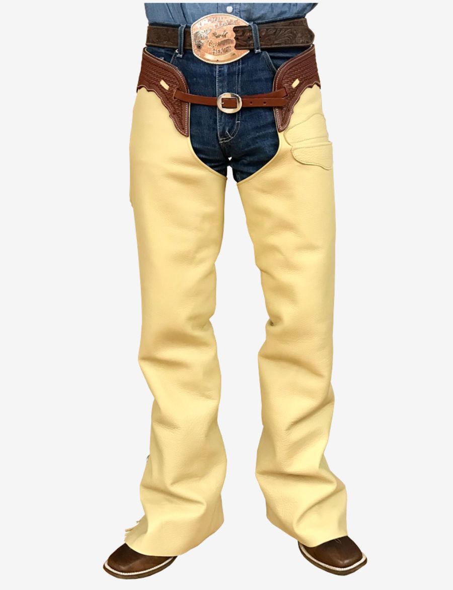 Front view of cream leather western shotgun chaps with smooth cowboy leather finish and traditional riding design.