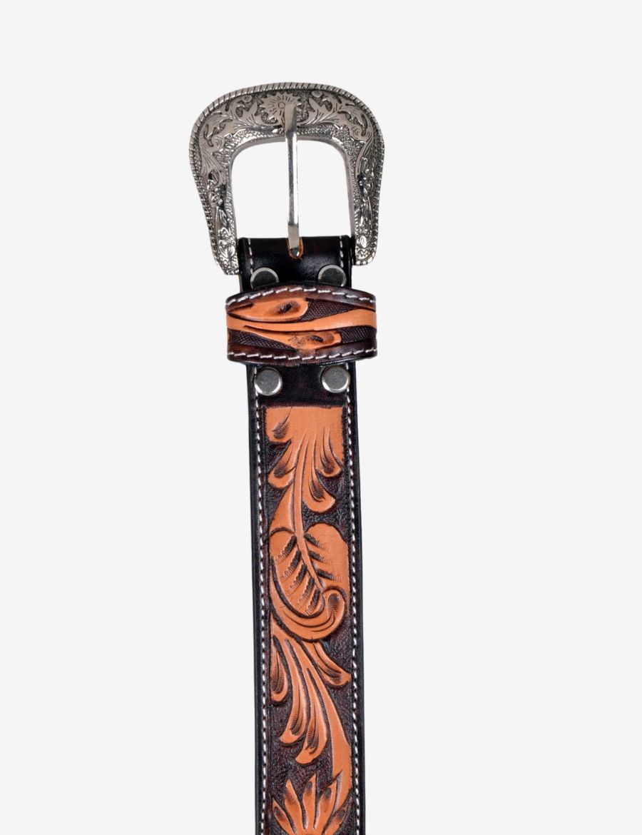 Front view of a cowboy carved western leather belt with engraved silver buckle and keeper loop.