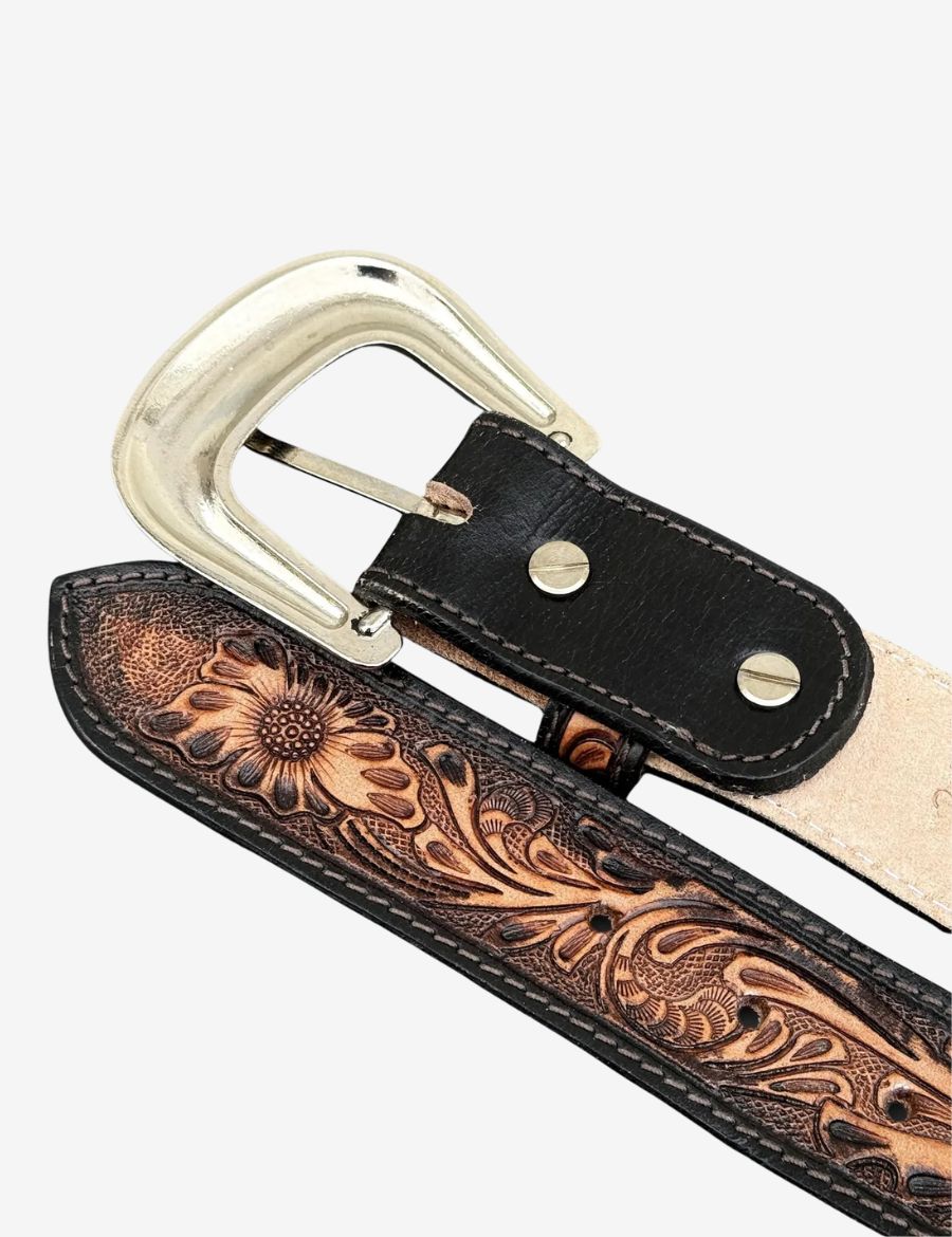 Back side view of floral tooled western belt showing removable buckle attachment and premium leather construction.