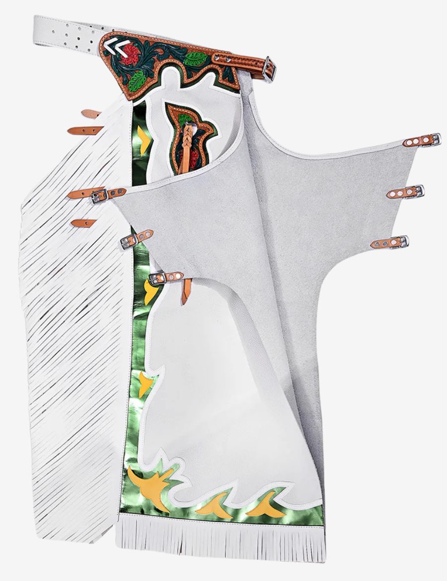 Inside suede view of white leather rodeo chaps featuring adjustable buckle straps and metallic green trim.