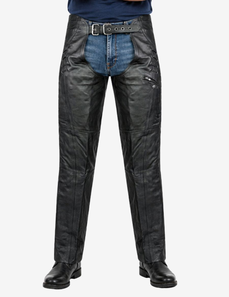Male model wearing black leather assless chaps with slim biker fit, side lacing, and smooth cowhide finish.