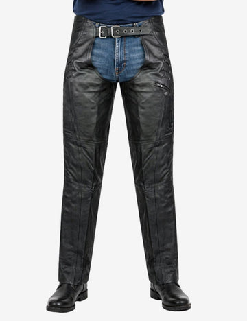 Male model wearing black leather assless chaps with slim biker fit, side lacing, and smooth cowhide finish.