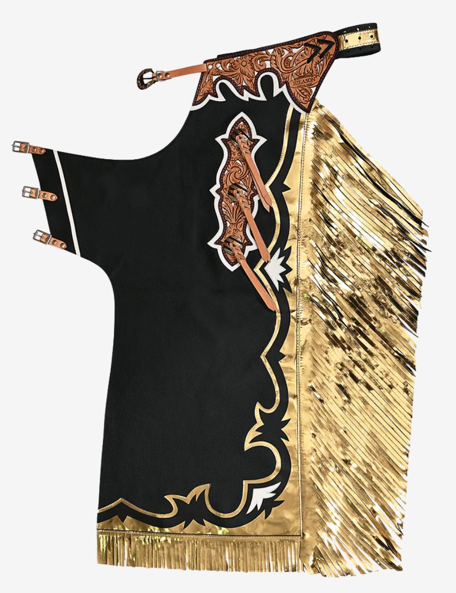 Black leather rodeo chaps with gold metallic fringe, floral tooling, and western rodeo detailing.