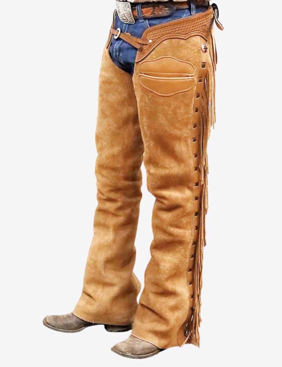Left front view of heritage tan cowboy chaps for men crafted in soft suede leather with western fringe styling.
