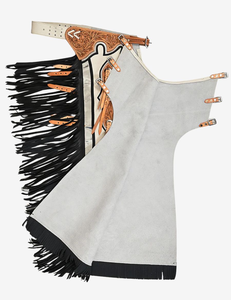 Inside view of ivory rodeo chaps featuring black fringe, suede lining, and adjustable buckle leg straps.