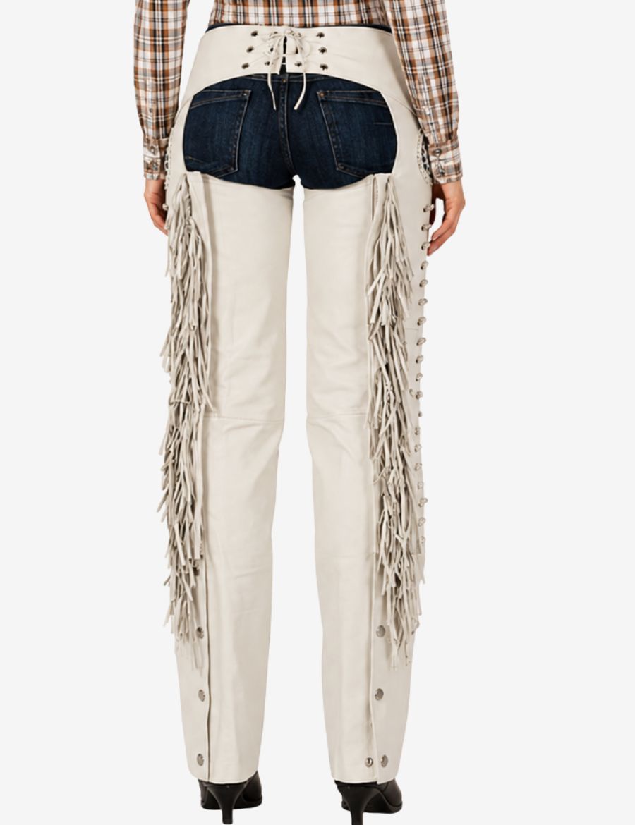 Back view of ivory western show chaps for women featuring long fringe trim and lace-up waistband detail.