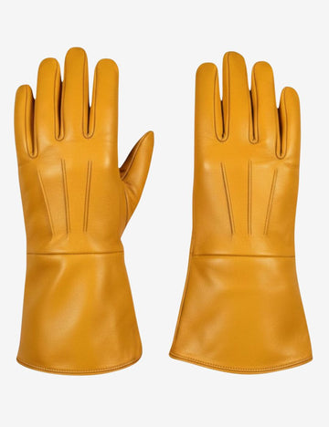 Golden tan leather bull riding gauntlet gloves with extended protective cuffs shown in full pair front view.