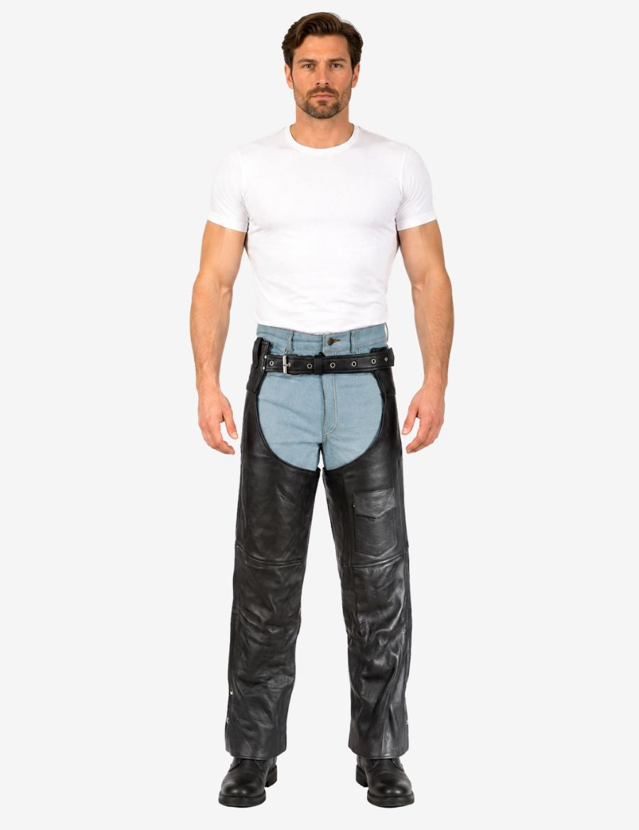 Male model wearing black cowhide leather assless biker chaps in loose fit motorcycle style.