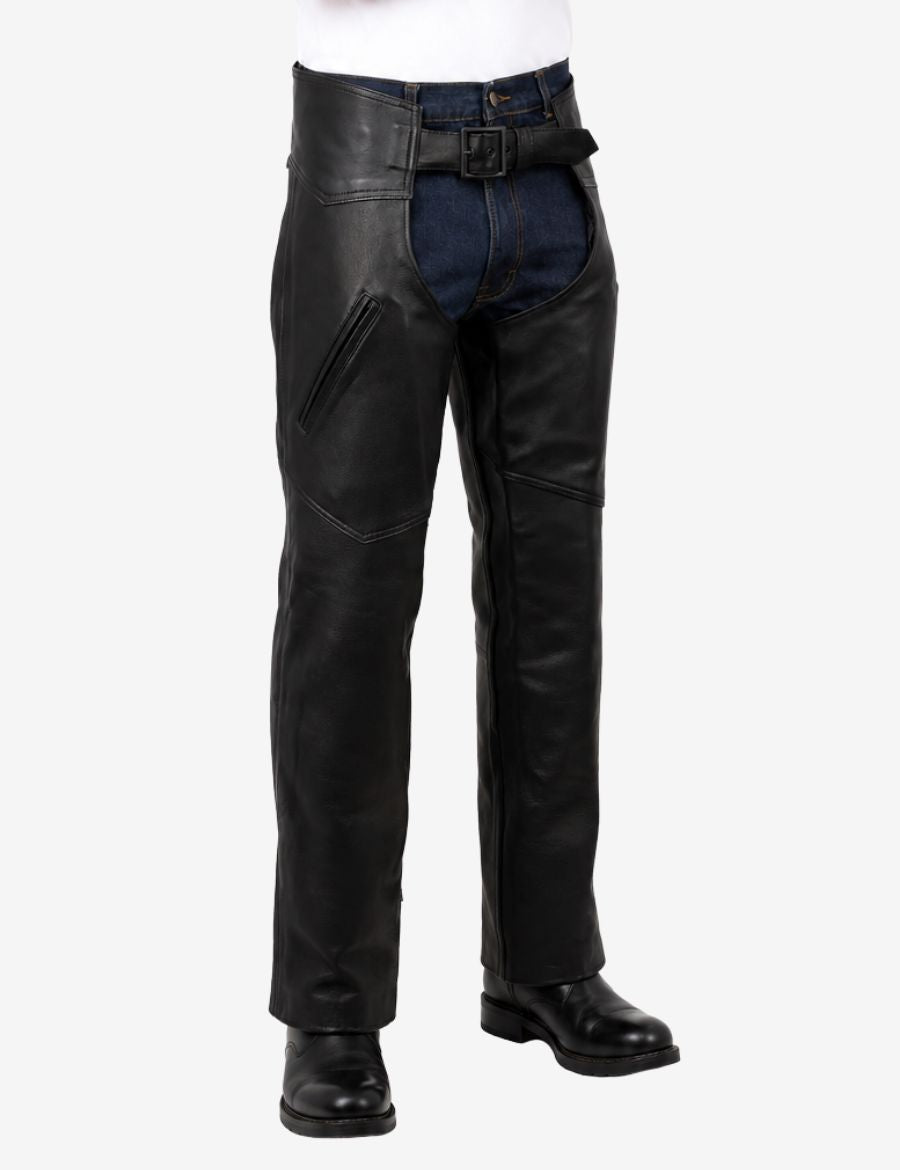 Angled front view of matte black biker chaps for men with zipper pocket detailing and premium leather construction.