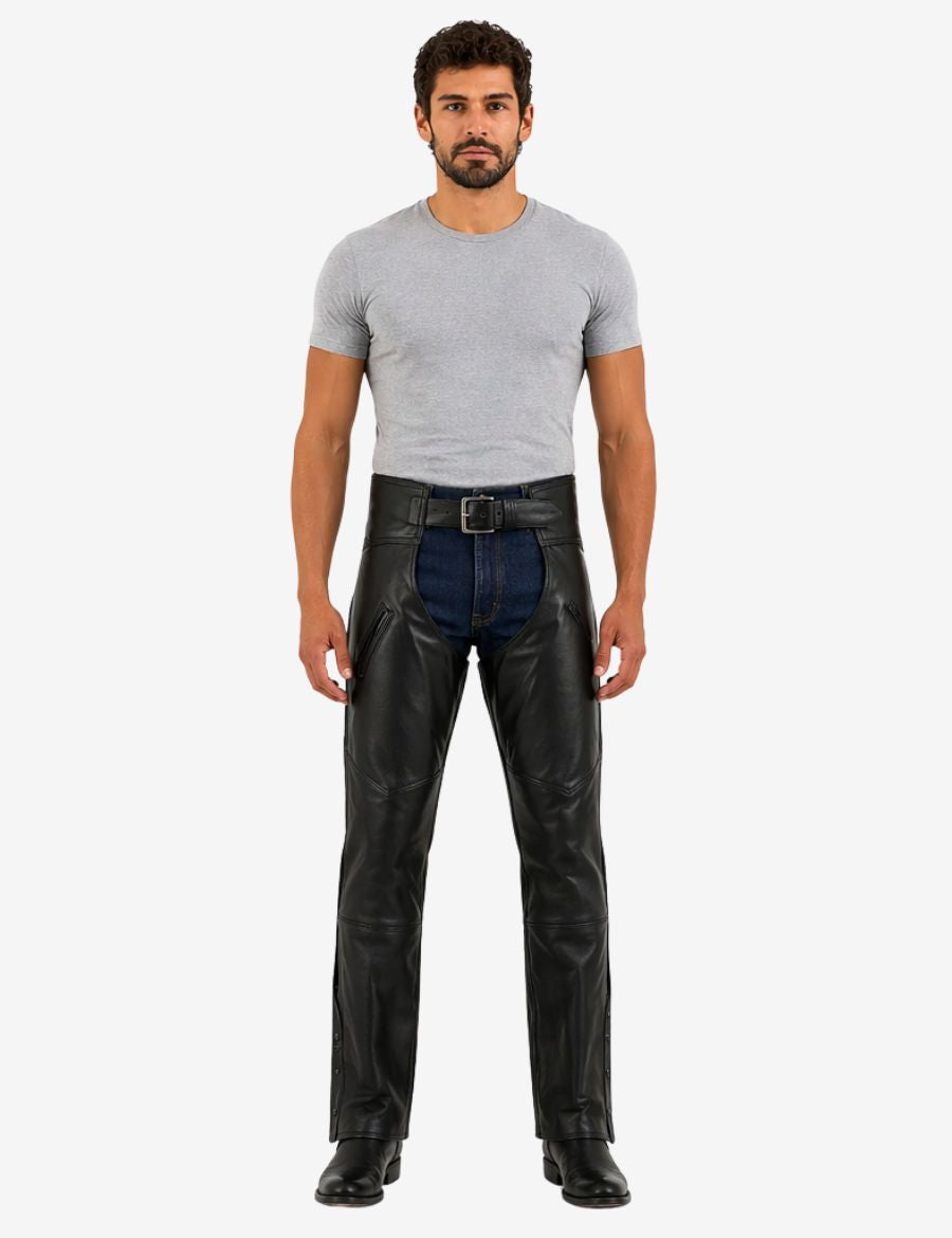 Angled front view of matte black biker chaps for men with zipper pocket detailing and premium leather construction.