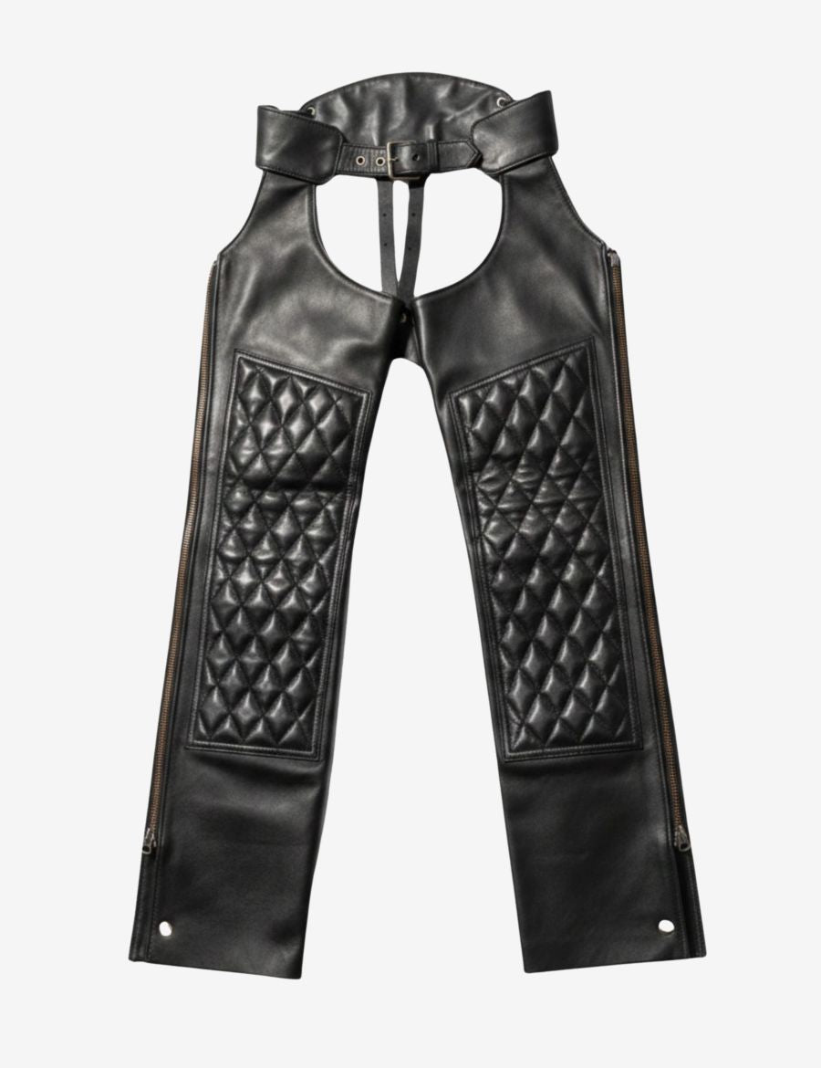 Front flat view of black leather assless biker chaps featuring quilted thigh panels and side zippers.