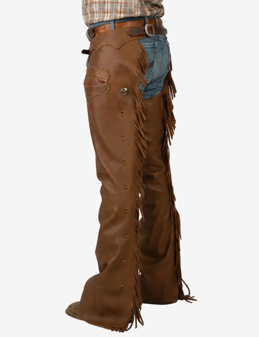 Side back view of mens saddle brown leather western chaps with fringe trim and traditional cowboy riding design.