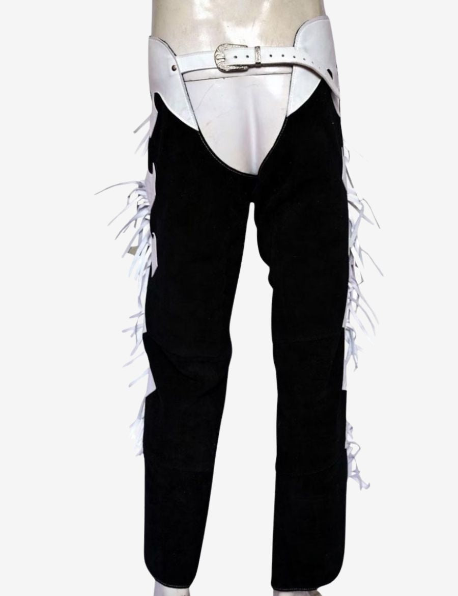 Front product view of black and white western leather chaps with long fringe and adjustable waist belt.
