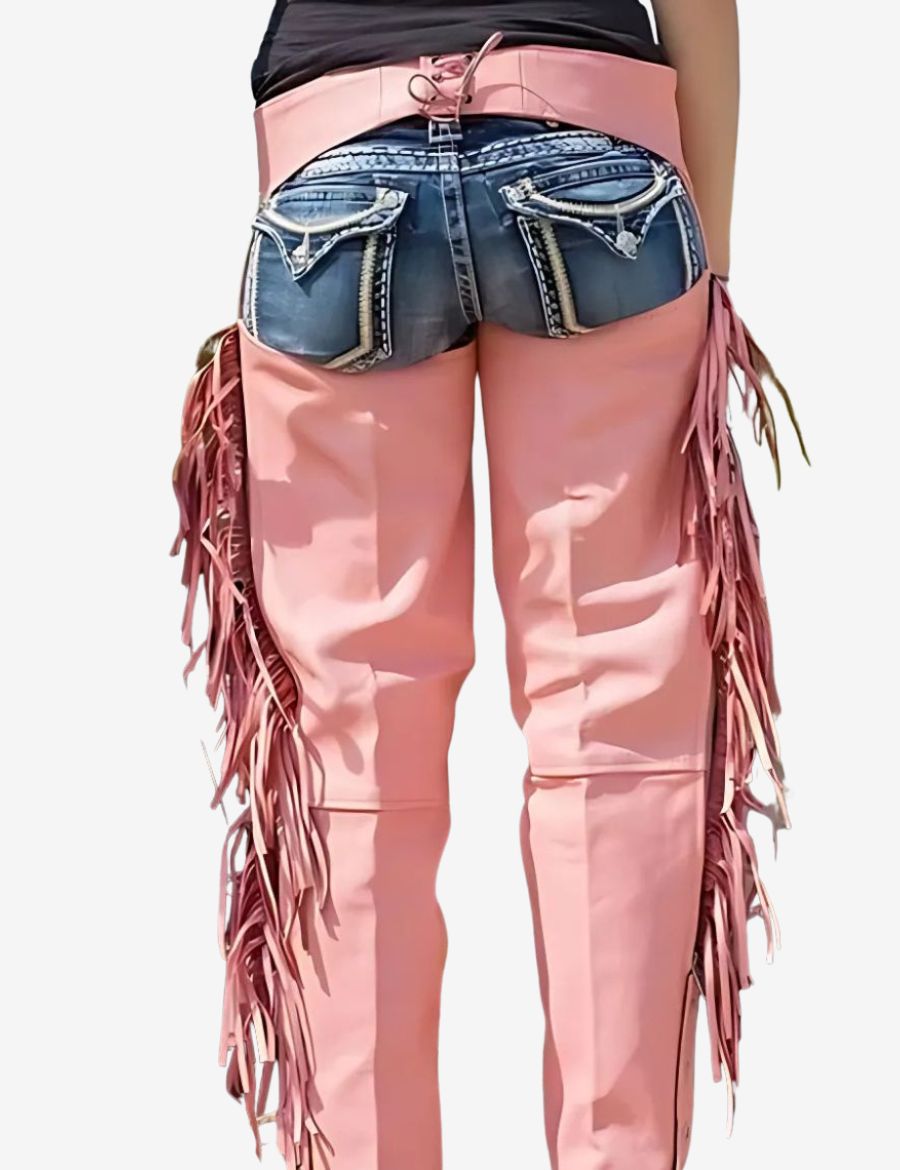 Pink fringe motorcycle chaps displayed on a motorcycle showcasing flowing fringe details and women's biker fashion.