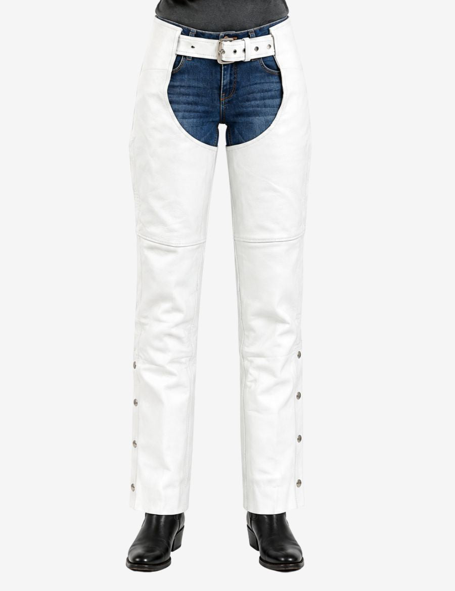 Front view of premium white leather women’s motorcycle chaps with belt closure, full-leg protection, and fitted riding design worn by model.