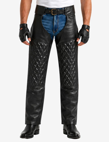 Male model wearing quilted black leather assless chaps with padded biker panels and smooth leather finish.