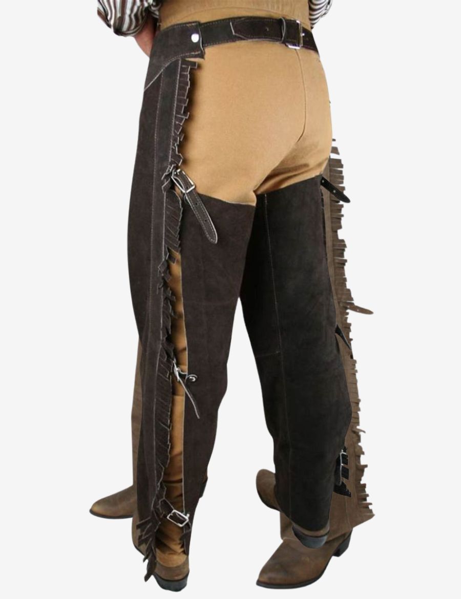 Rear view of ranch cowboy working chaps with adjustable leg straps, fringe trim, and reinforced suede construction.