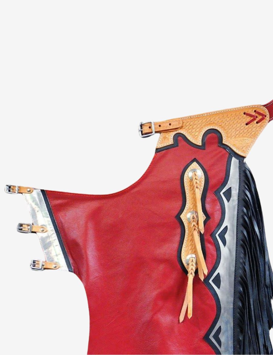 Yoke view of red leather bull riding chaps showcasing tooled leather waist design and braided concho details.