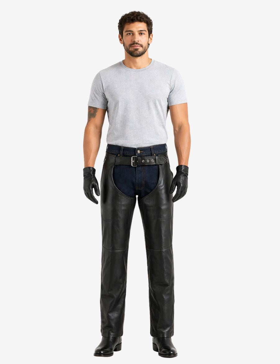Angled front view of soft leather motorcycle chaps for men featuring utility pocket and reinforced riding panels.