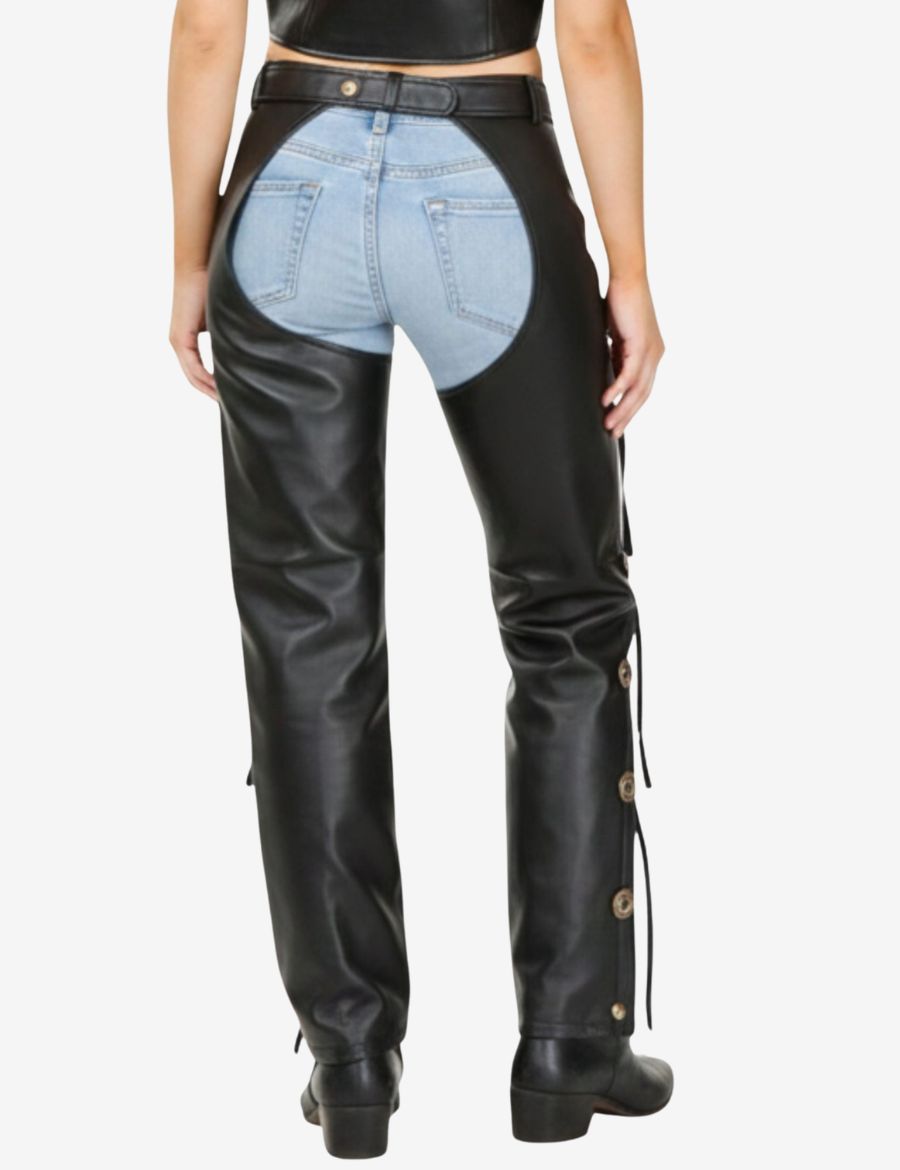 Back view of stylish womens black assless chaps showcasing an open-seat design, fitted leather leg panels, and western-inspired concho detailing.