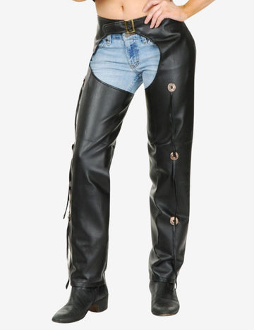 Front view of stylish womens black assless chaps featuring a low-rise waist, decorative concho accents, and sleek leather motorcycle styling.
