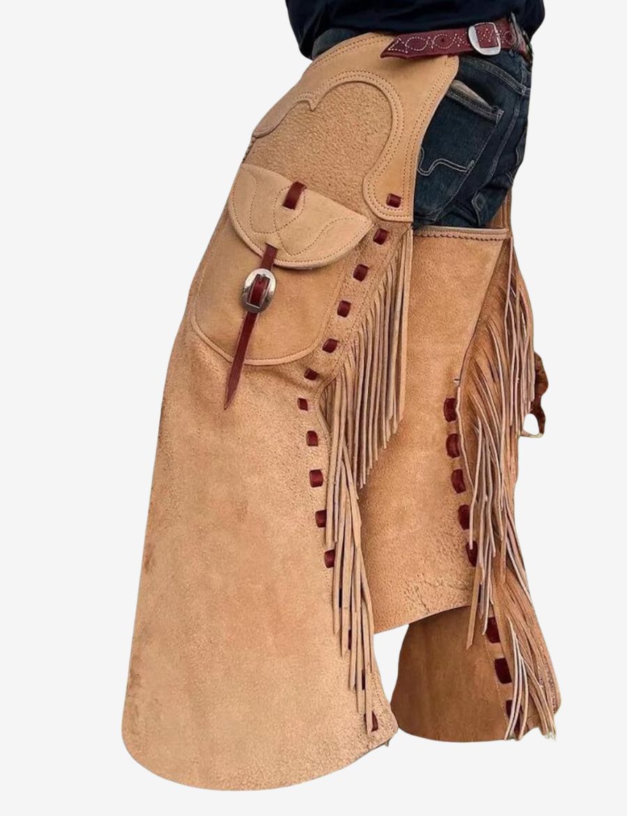 Side view of tan batwing chaps with fringe, suede leather construction, utility pocket, and traditional western style.