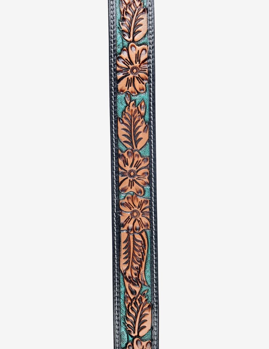 Detailed view of floral and leaf tooling with turquoise inlay on a western leather belt.