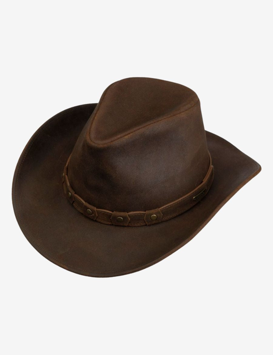 Western brown suede leather cowboy hat with a classic shaped crown, curved brim, distressed finish, and riveted leather hatband.