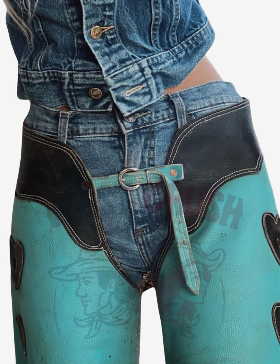 Close-up view of turquoise western chaps featuring contrast leather belt and stitched scallop detailing.
