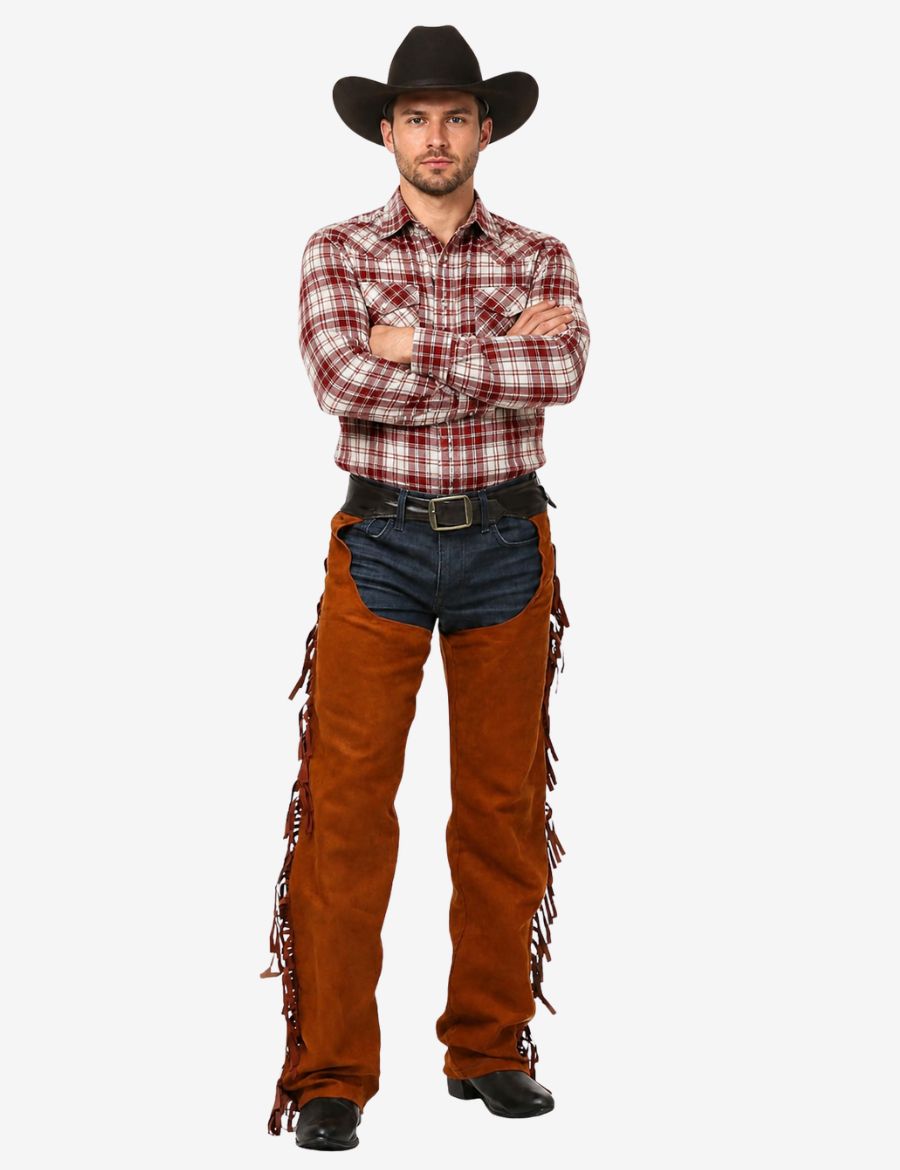 Male model wearing wild west cowboy chaps in brown suede with long western fringe details.