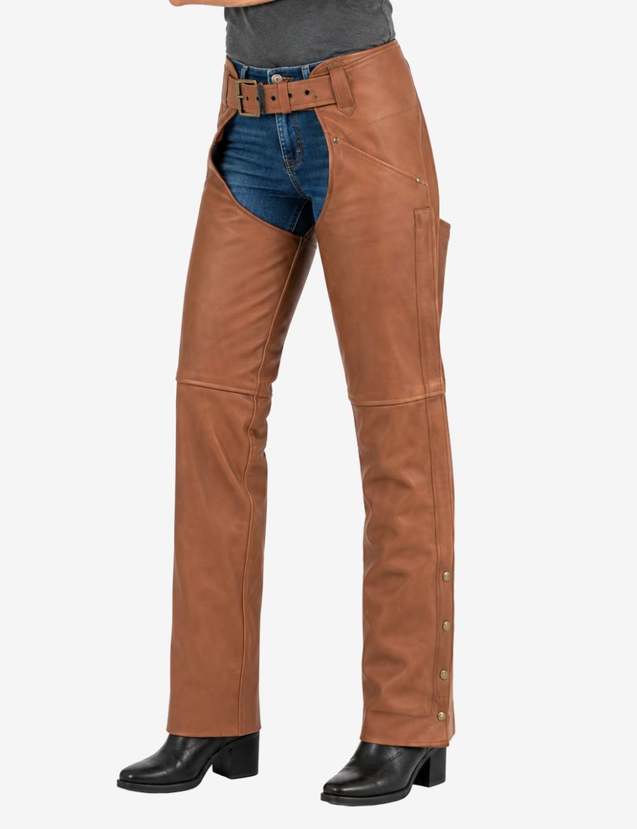 angle view of womens brown leather assless chaps with smooth leather construction, snap-leg closures, and an adjustable buckle waistband.
