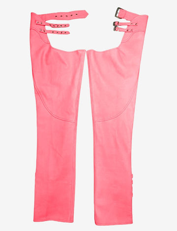 Front view of womens buckled pink assless chaps featuring triple adjustable waist straps, smooth leather construction, and a bold biker-inspired design.